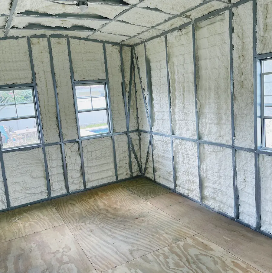 Closed-cell spray foam insulation applied to wall cavities in a residential project in Palmyra